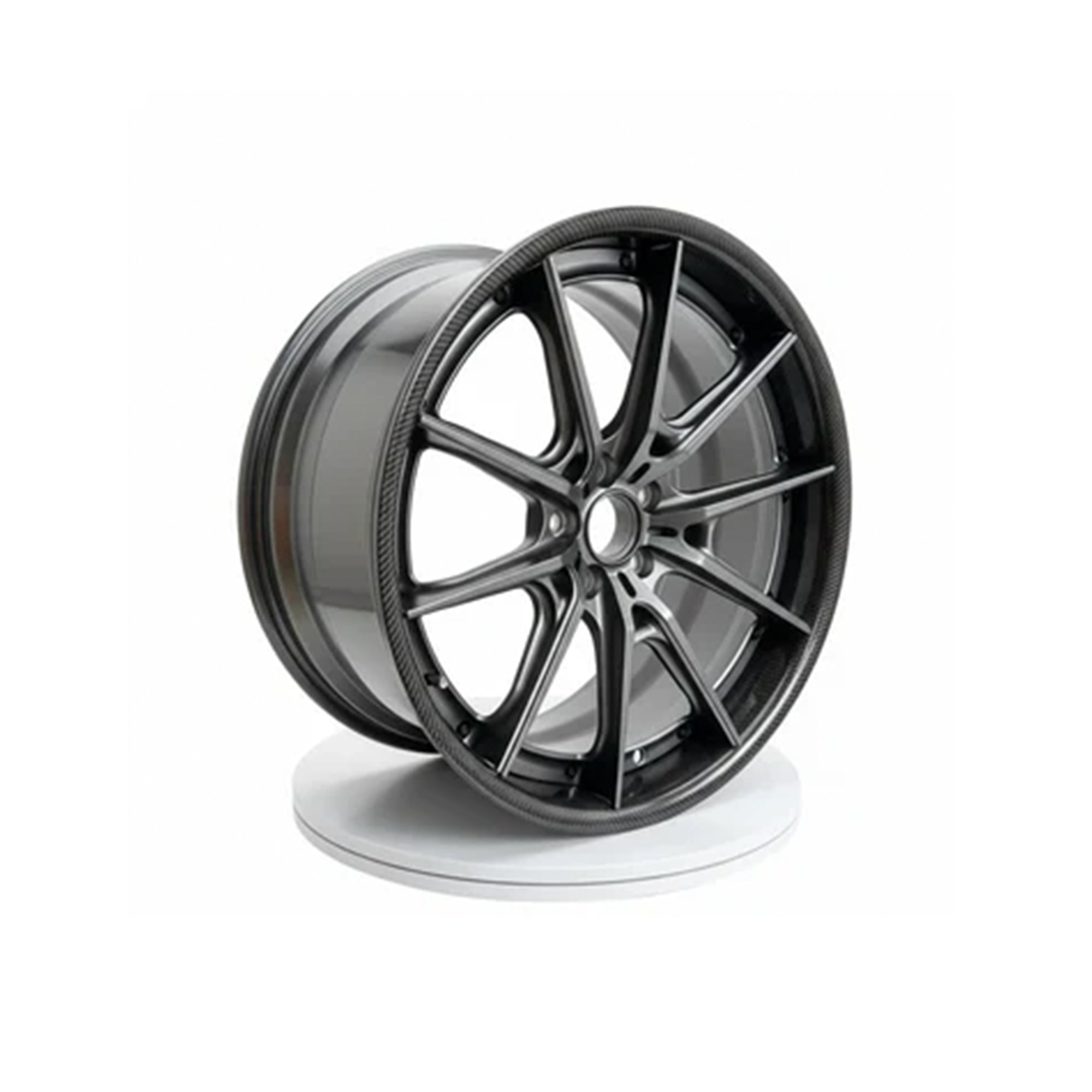 Custom forged full carbon fibre wheel from WheelWorkCustoms, showcasing a sleek, lightweight design with intricate carbon fiber detailing.