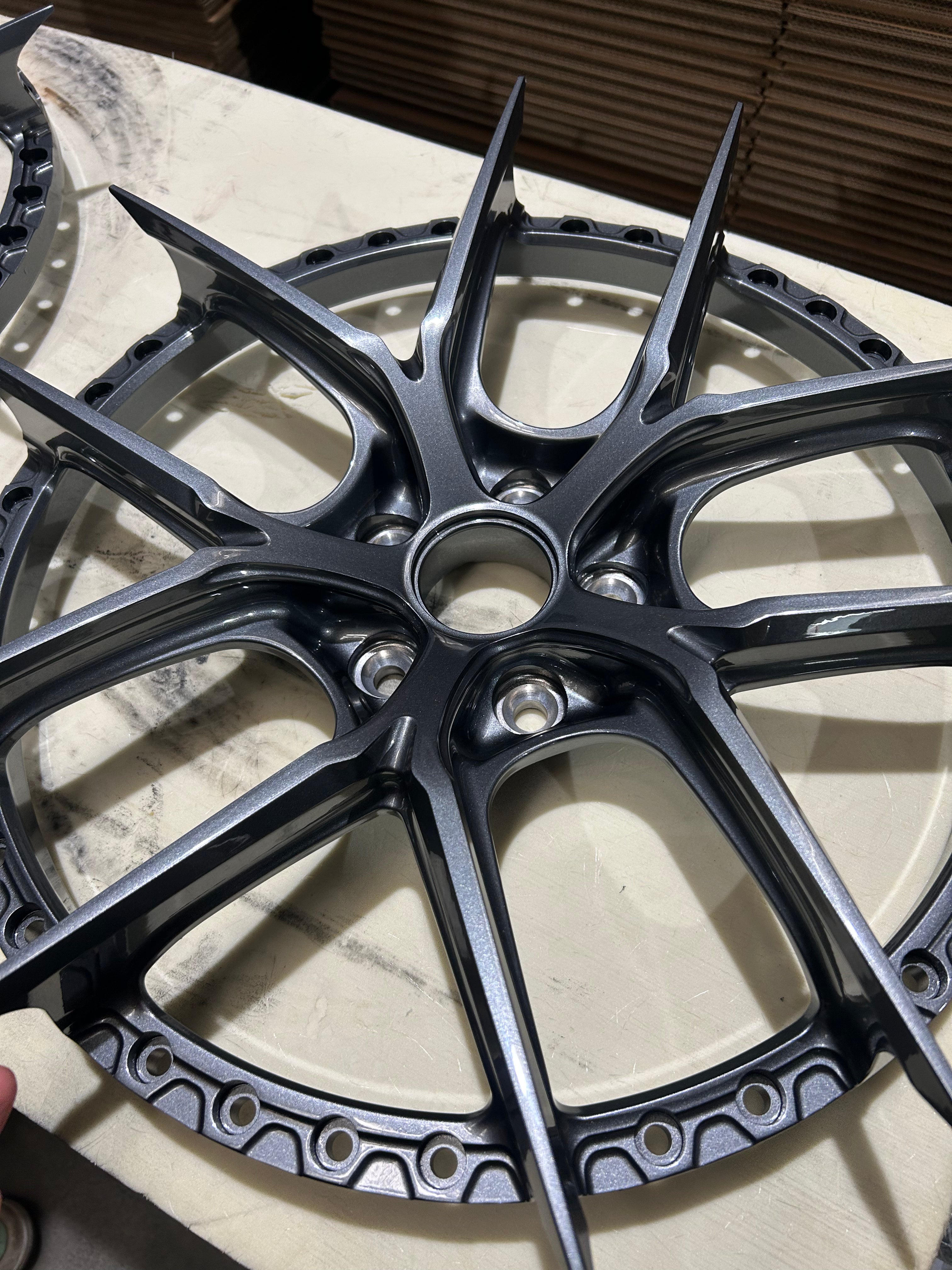 Custom forged WWC RoyalMesh 2-piece wheel by WheelWorkCustoms, featuring a polished finish and intricate mesh design.