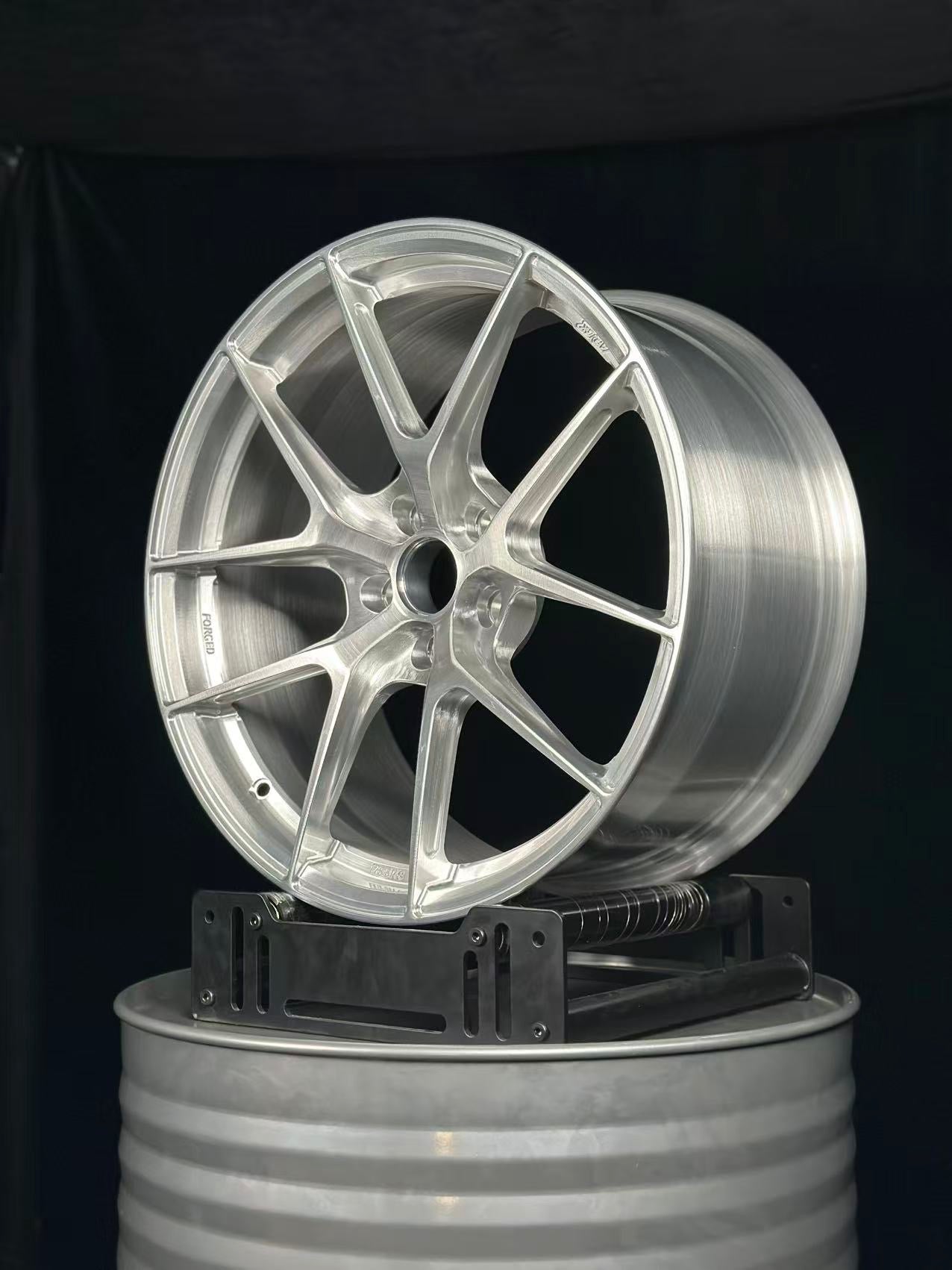 Custom Forged WWC VS5R 5-spoke performance wheel by WheelWorkCustoms shown in a sleek metallic finish.