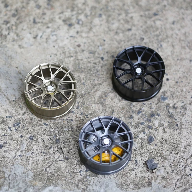 Miniature Wheel Air Freshener REV-7 by WheelWorkCustoms featuring realistic wheel design and compact size.