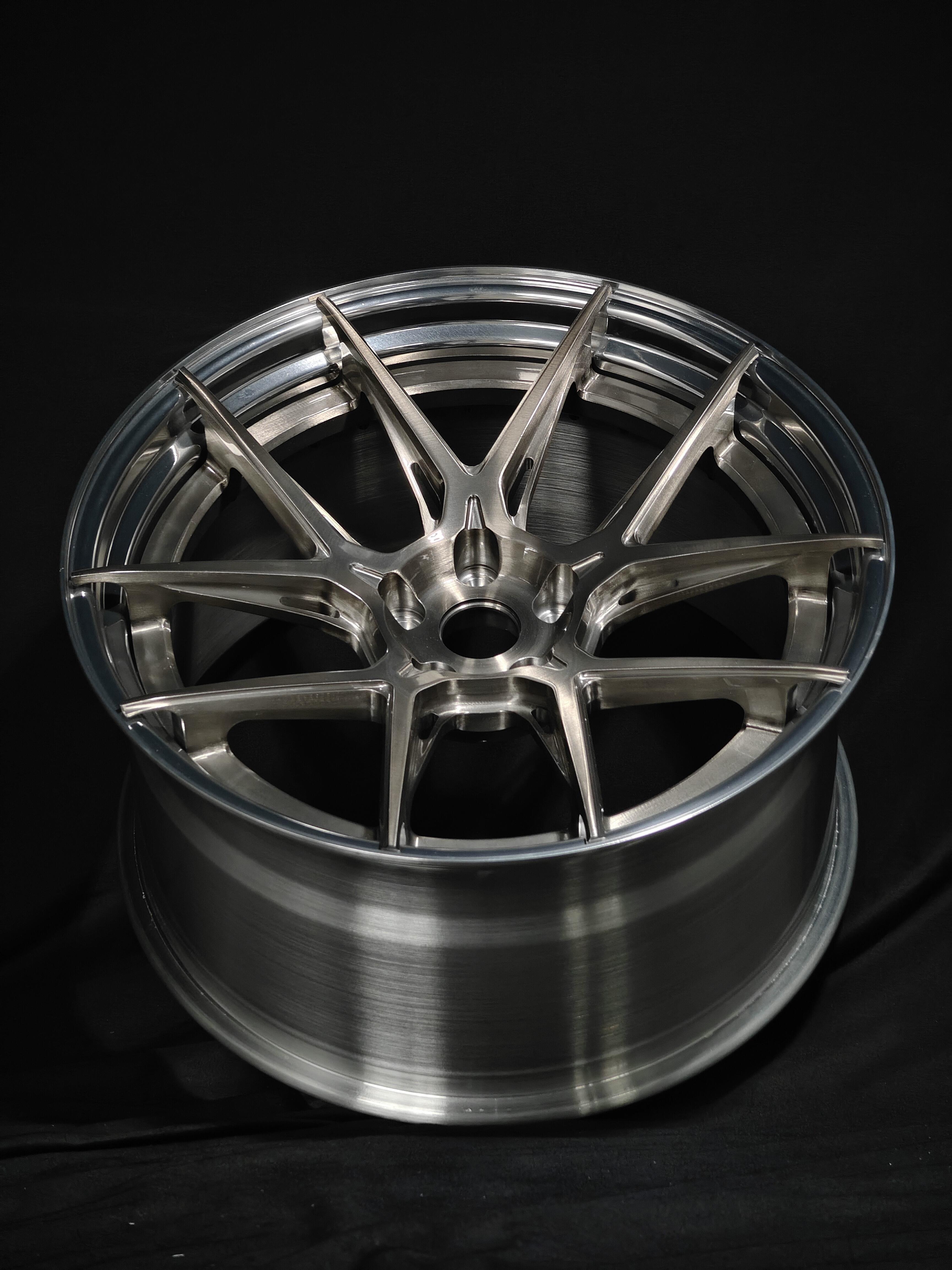 Custom Forged WWC Velocity GT lightweight performance wheel showcasing sleek design and precision engineering.