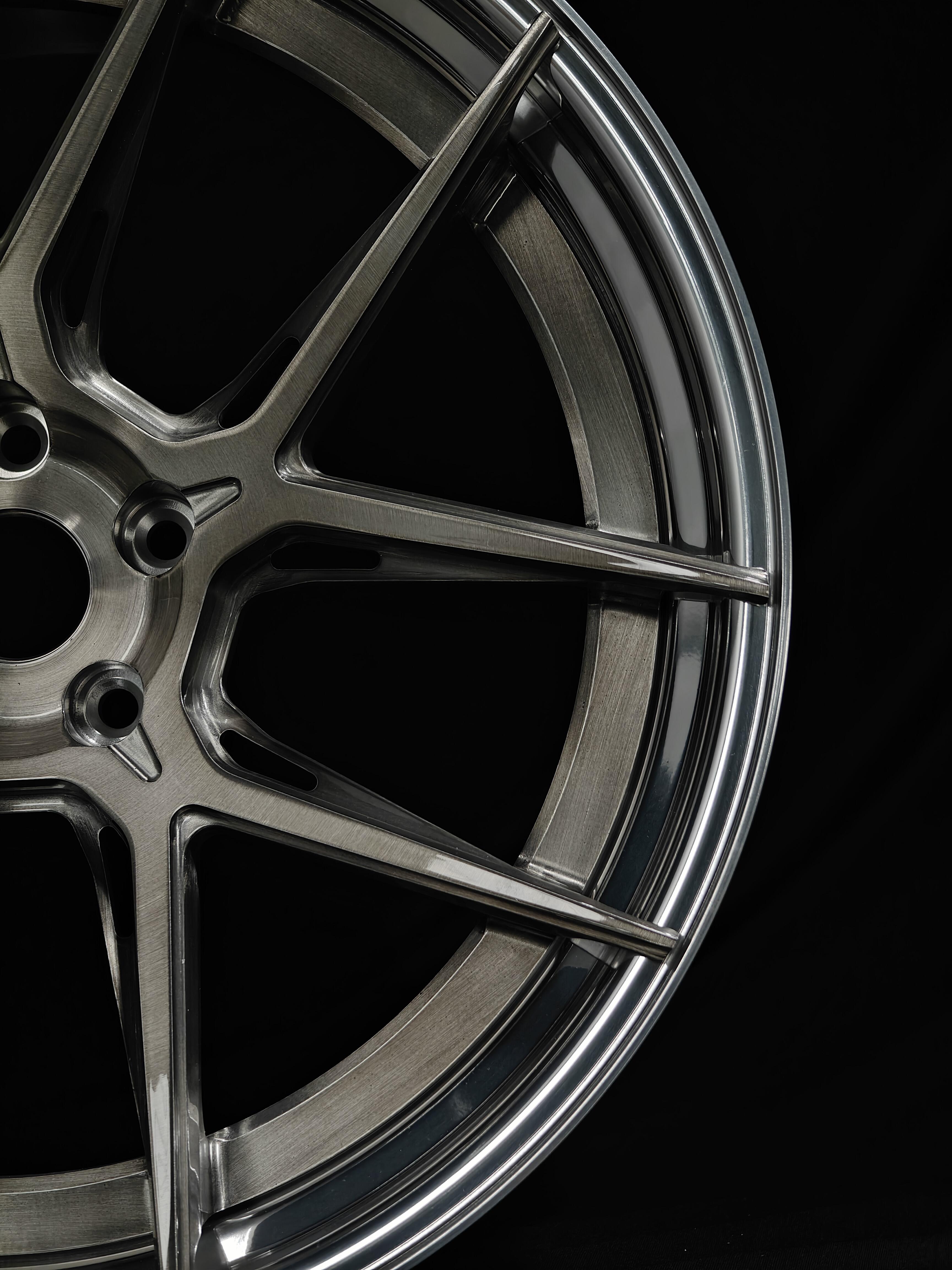 Custom Forged WheelWorkCustoms Velocity GT lightweight performance wheel with a sleek design and intricate spoke pattern.